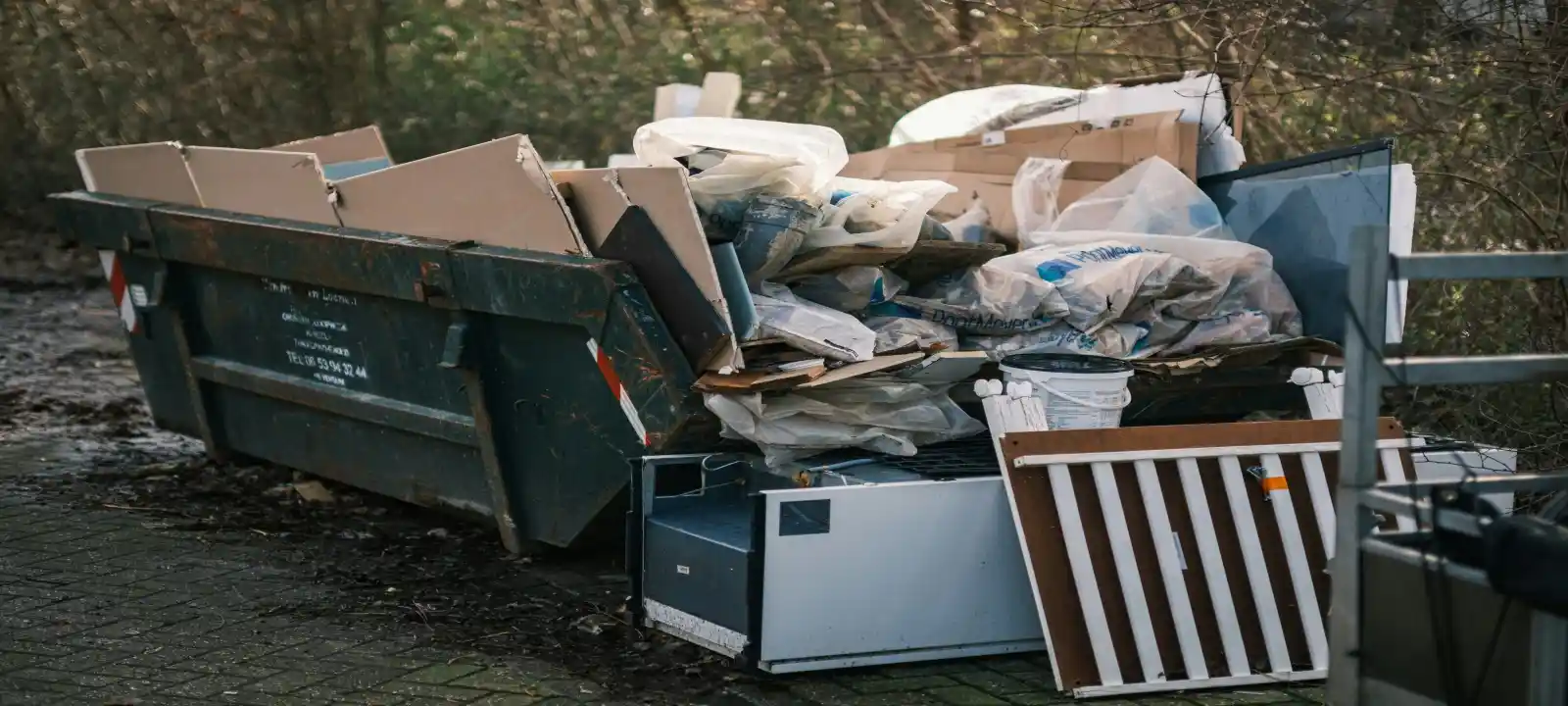 Large amounts of waste piled inside skip bins in the Wollongong area.